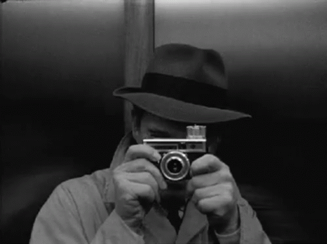 camera-light-flashing-knigso9d7u9pag8g.gif