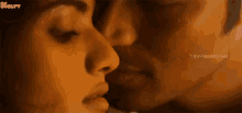 kiss-dhanush.gif