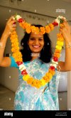 beautiful-indian-receptionist-welcomes-guests-to-hotel-in-india-with-A4K8D5.jpg
