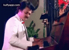 thalaivar-on-the-keys-piano.gif