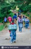 nagar-himachal-pradesh-india-indian-schoolchidren-walk-on-a-steep-dirt-road-on-their-way-home-...jpg