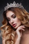 beauty-woman-face-with-beautiful-make-up-colors-image-queen-dark-hair-crown-his-head-clear-ski...jpg