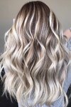 shades-platinum-blonde-hair-long-wavy-brunette-highlights-layered-cut.jpg