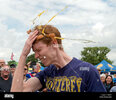 participant-playing-russian-roulette-with-eggs-at-the-world-egg-throwing-championships-swaton-...jpg