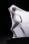 studio-shot-woman-wrapped-fabric-against-black-background-hardest-prison-to-escape-your-mind-s...jpg