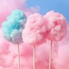 two-pink-cotton-candy-one-blue-cotton-candy-sticks-against-light-pink-blue-background_885831-7...jpg