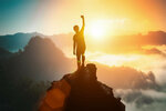silhouette-of-positive-man-celebrating-on-mountain-top-with-arms-raised-up-silhouette-of-man.jpg