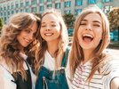 three-young-smiling-hipster-women-summer-clothes-girls-taking-selfie-self-portrait-photos-smar...jpg