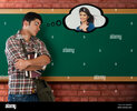 university-student-thinking-of-his-girlfriend-in-a-classroom-D0W9TW.jpg university-student-thinking-of-his-girlfriend-in-a-classroom-D0W9TW.jpg