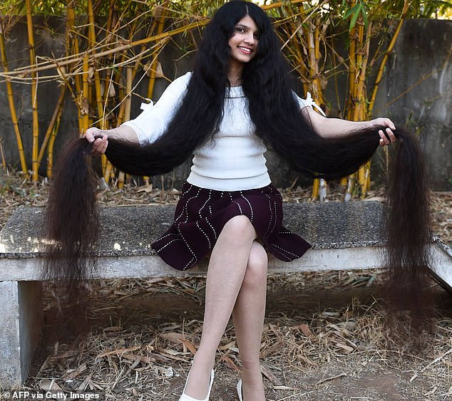 Nilanshi Patel, 17, has retained her crown as the teen with the world's longest hair of 6.23ft